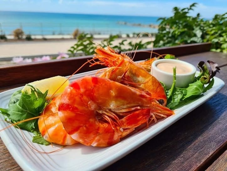 Fresh prawns with ocean views at Seasons by the Sea restaurant, Penguin