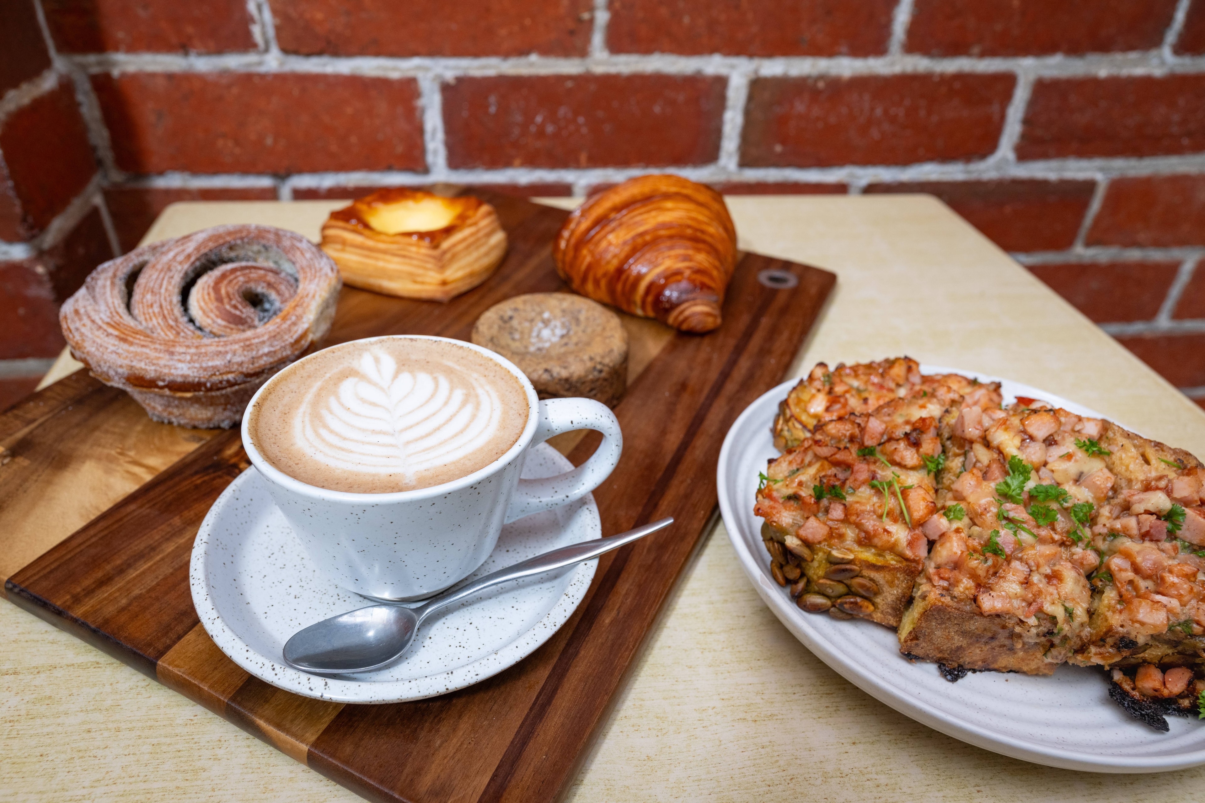 Coastal café with coffee, pastries and ocean views at Sips Penguin