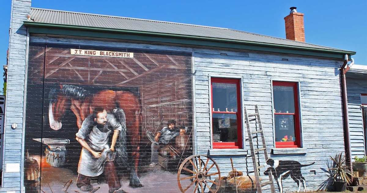 J.T. King Blacksmith mural painted on a building in Sheffield, Tasmania
